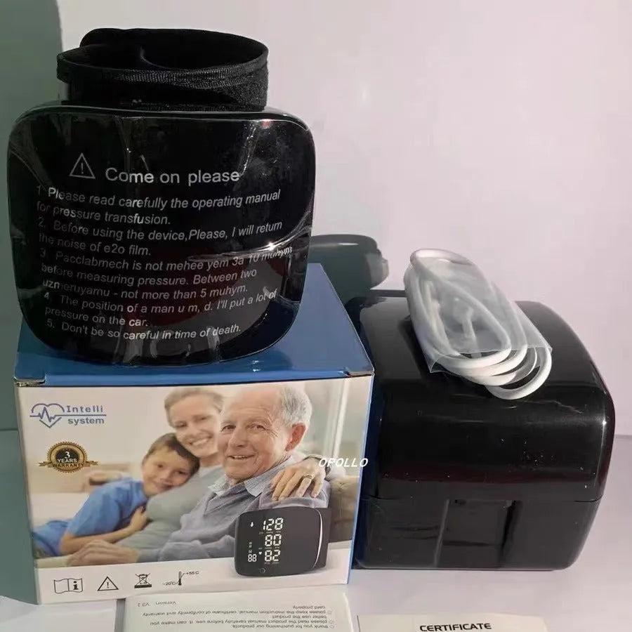 Black wrist rechargeable blood pressure monitor with USB port and digital display.