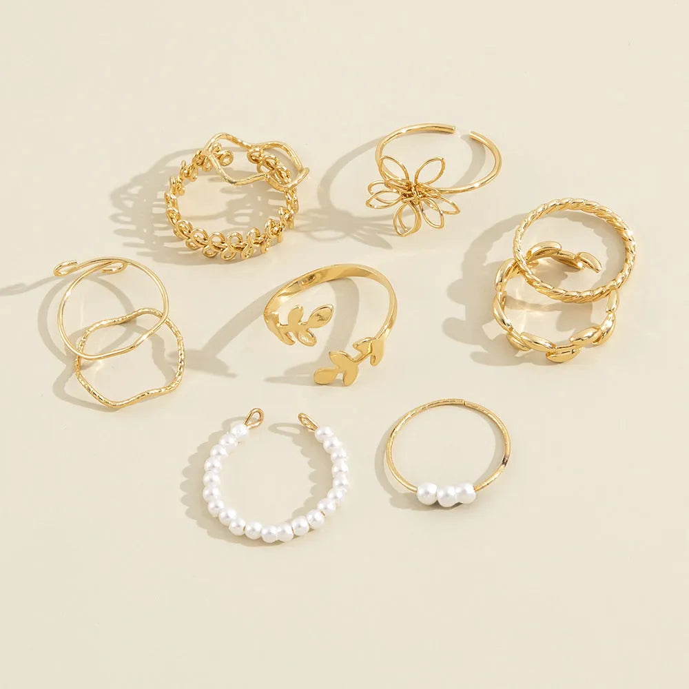 Women's openwork flower ring in gold colour J0656 with glossy electroplated finish and floral detailing