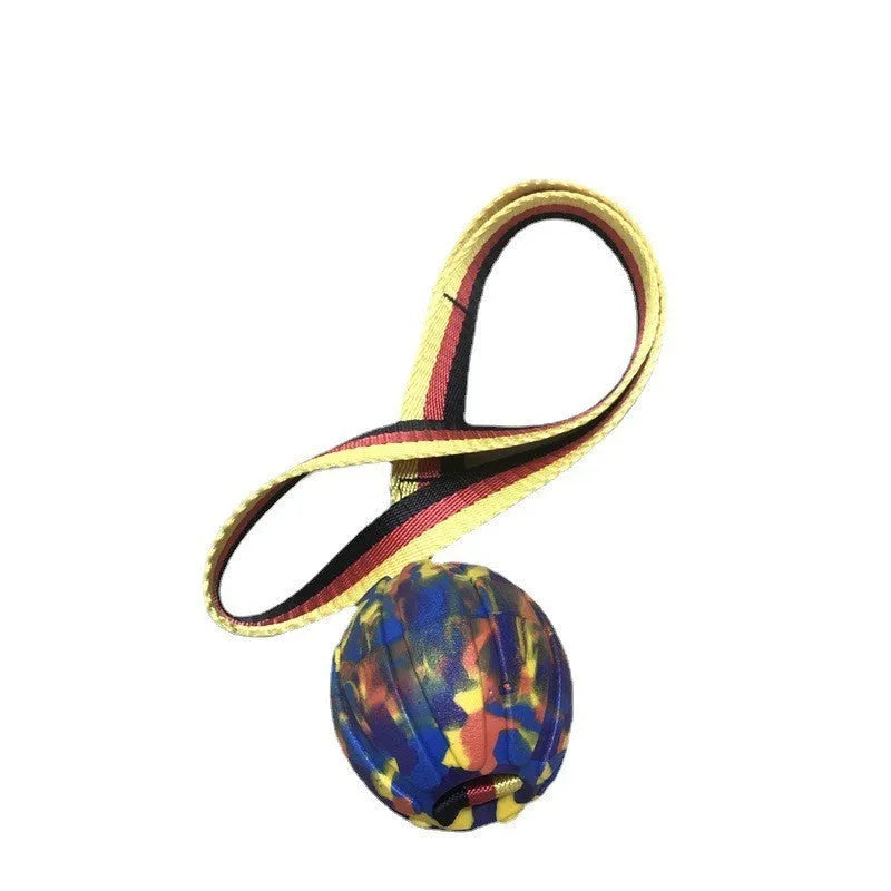 EVA floating pet tetherball toy in yellow and camouflage colours with string attachment