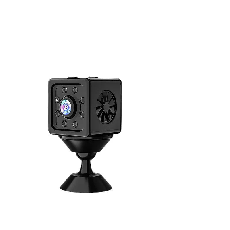Black cubic K13 network sports camera with mounting bracket on a table