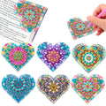 Six handmade PU leather bookmarks with stick-on crystal flowers in cornerite designs