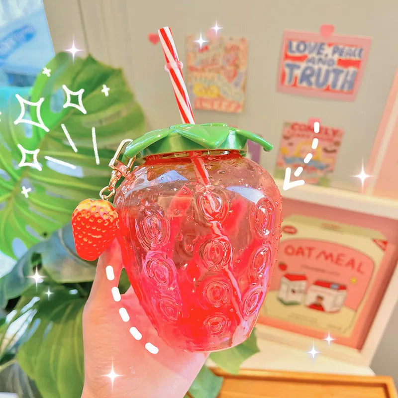 500ml kawaii strawberry-shaped water bottle with straw and pendant on white background