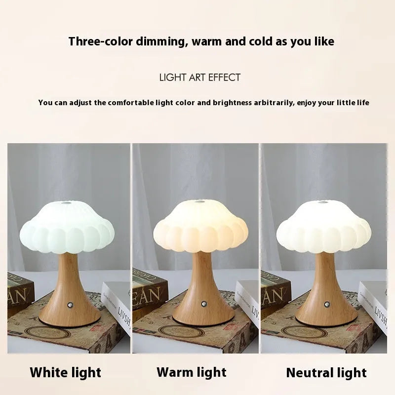 Mushroom-shaped touch control night lamp in wood grain colour on a wooden table.