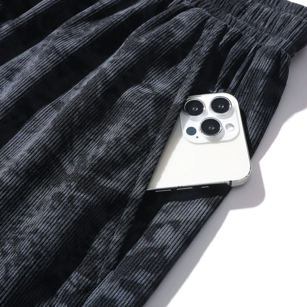Men's camouflage pattern corduroy athletic shorts in straight cut with high waist.
