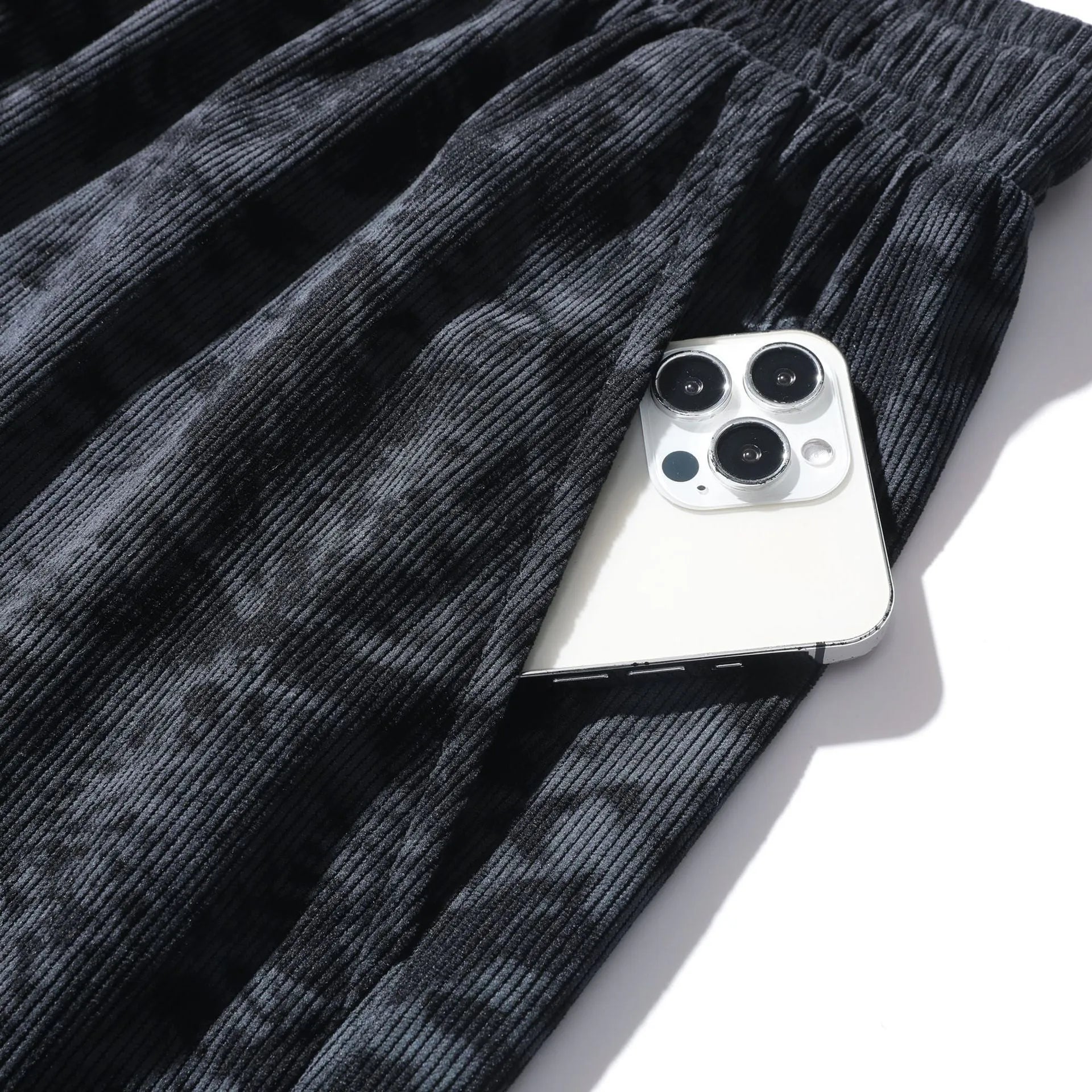 Men's camouflage pattern corduroy athletic shorts in straight cut with high waist.