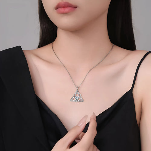 Geometric Celtic knot pendant necklace for women in a choice of blue, lvzuan, red diamond, or white diamond finish.