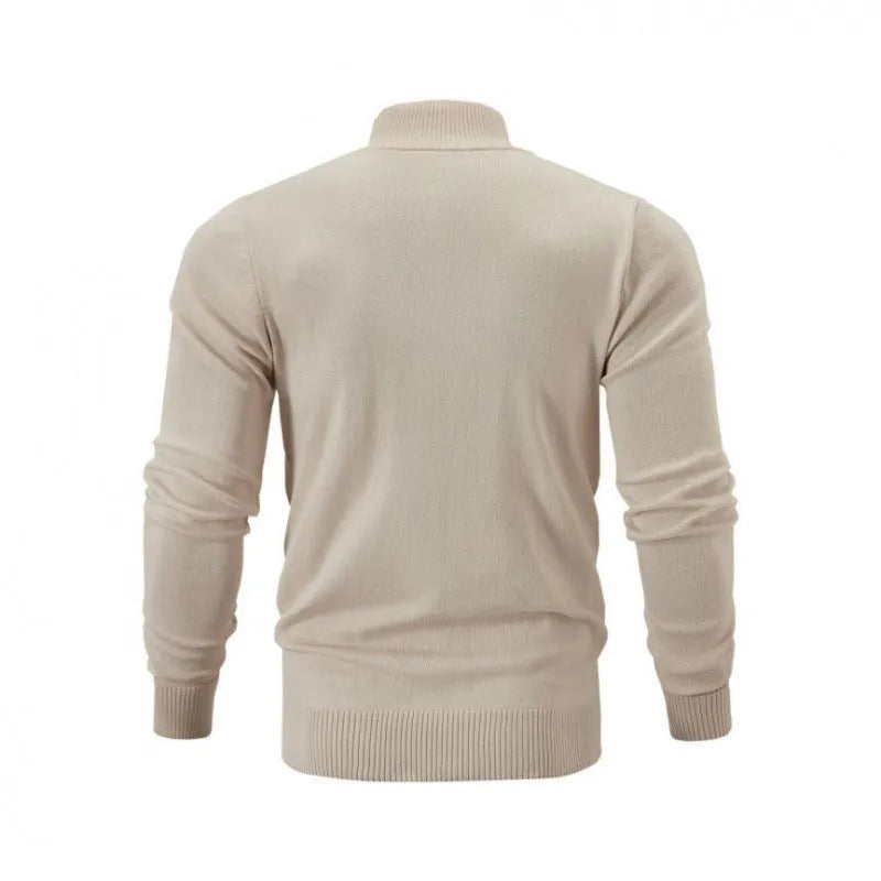 Man wearing a stand collar zip-front casual sweater in a solid colour, showing loose fit and front zipper detail.