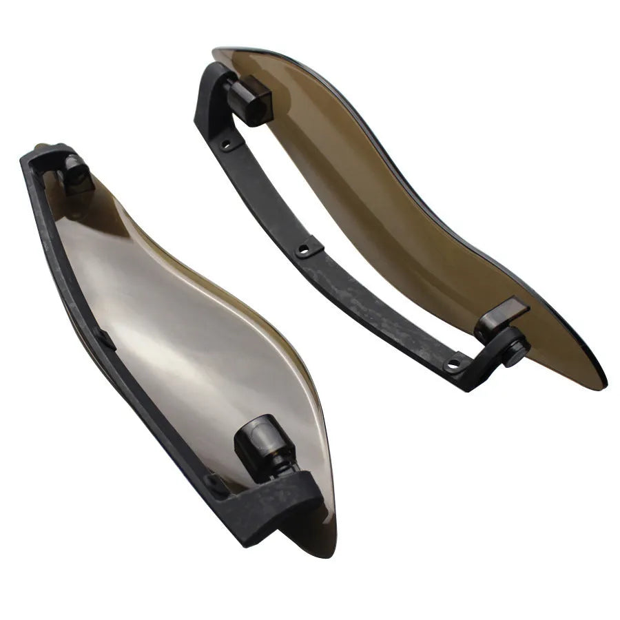 Pair of smoked ABS windshield side wings for a Harley-Davidson trike conversion.