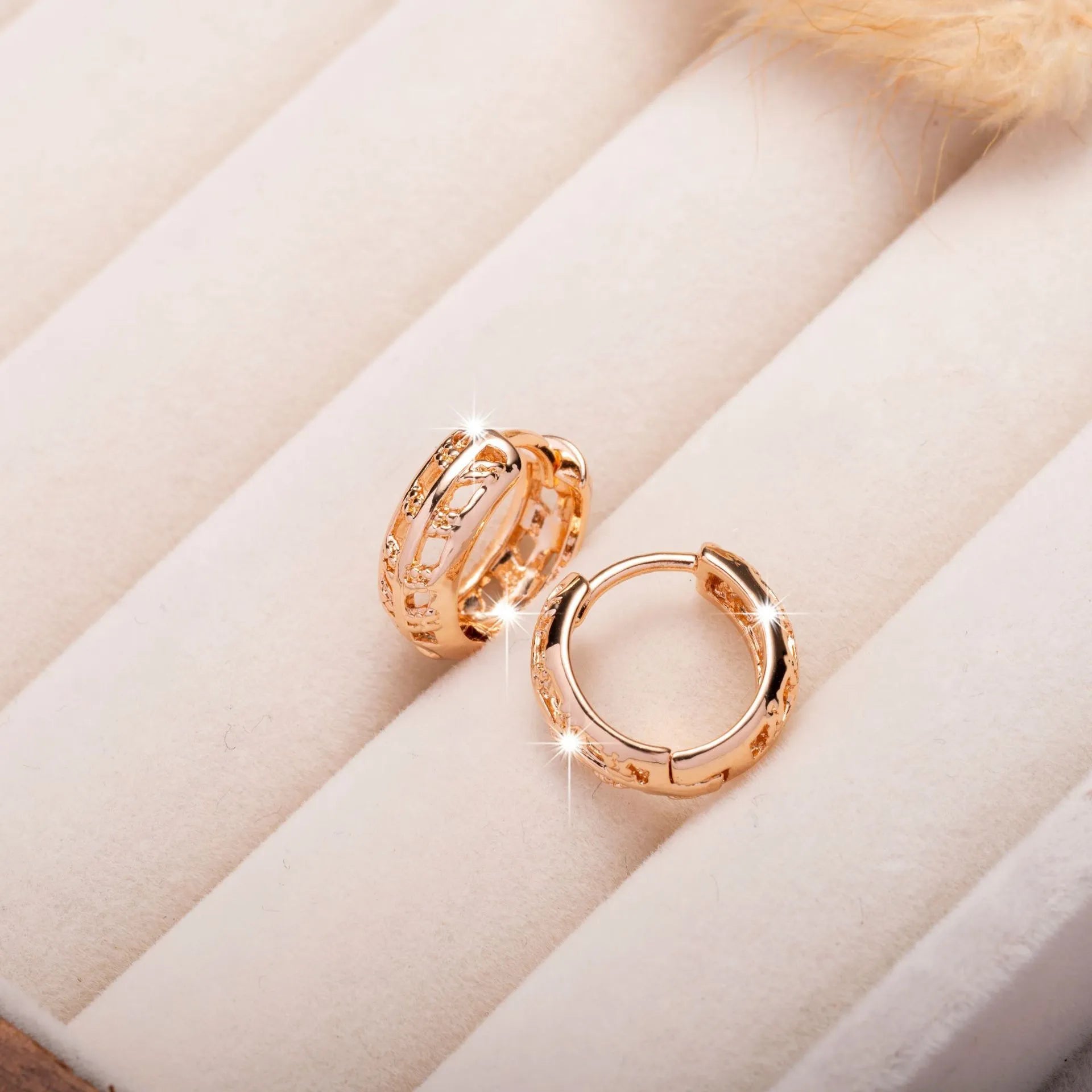 Copper rose gold hollowed-out leaf earrings with heart-shaped details