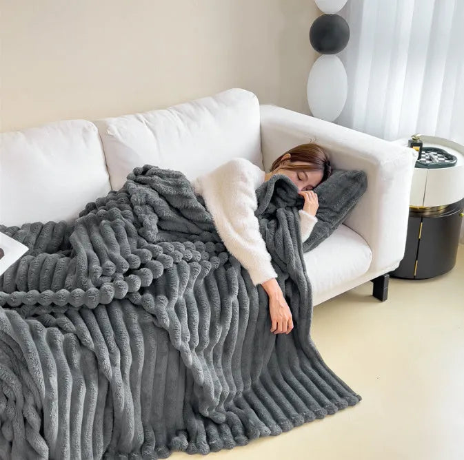 Solid colour bubble faux rabbit fur double-sided thickening blanket shown in a khaki colour