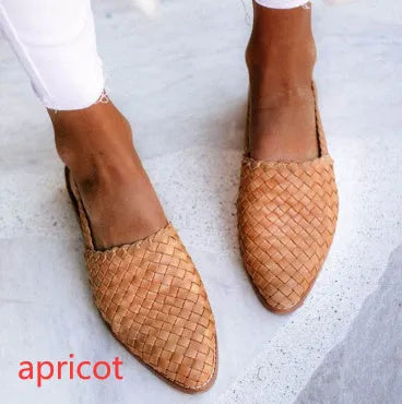 Women's buckle flat sandals with pointed toe in multiple colour options showing adjustable strap