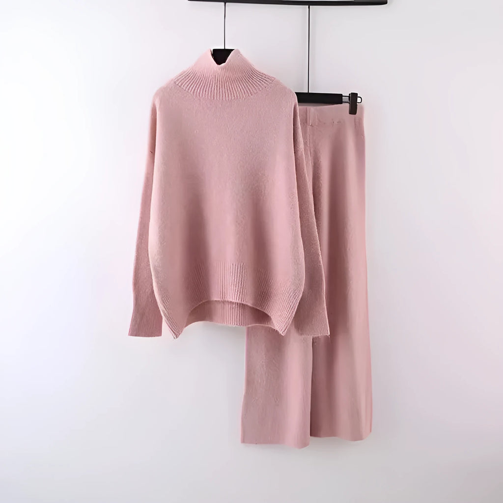 Women's beige acrylic sweater and wide-leg pants two-piece set laid flat.