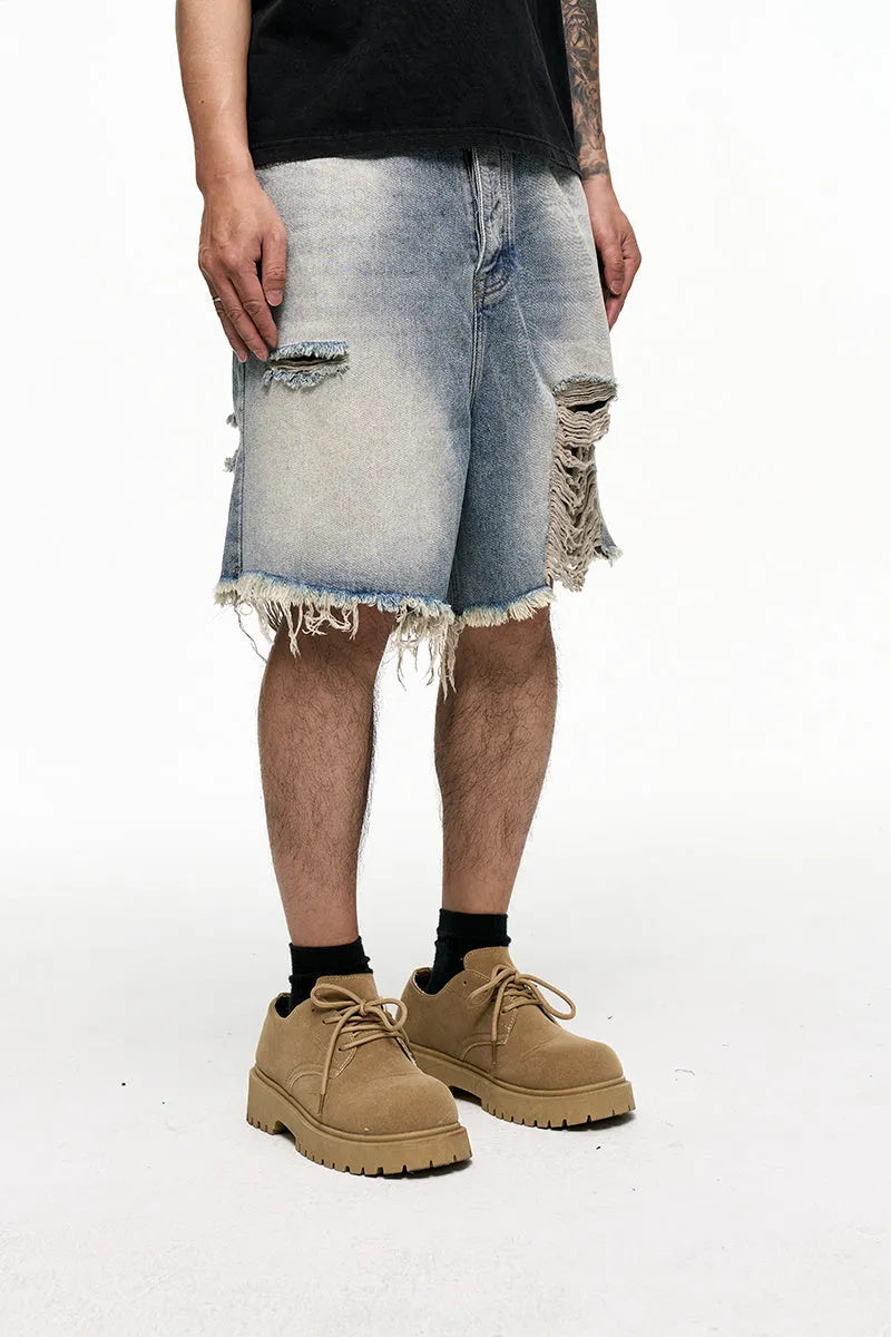 Men's light blue baggy denim shorts with wide leg retro washed design