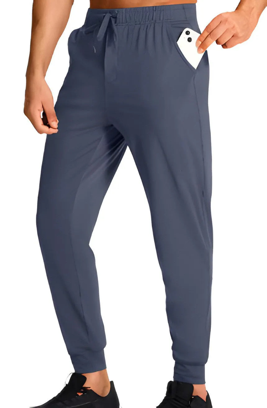 Men's loose fit casual trousers in solid colour with elastic waistband, available in multiple sizes