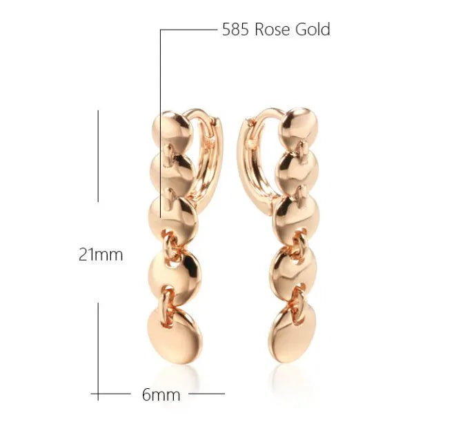 Gold woven copper circle earrings with retro circular design