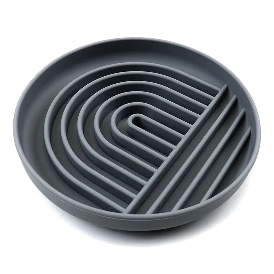 Silicone slow feeder dog bowl with ridge design, shown in beige colour, acting as a lick mat.