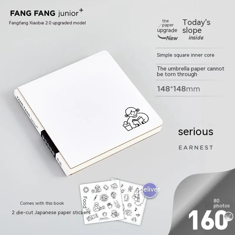 Square paper diary notebook with heart pattern cover showing checkered grid pages measuring 148x148mm
