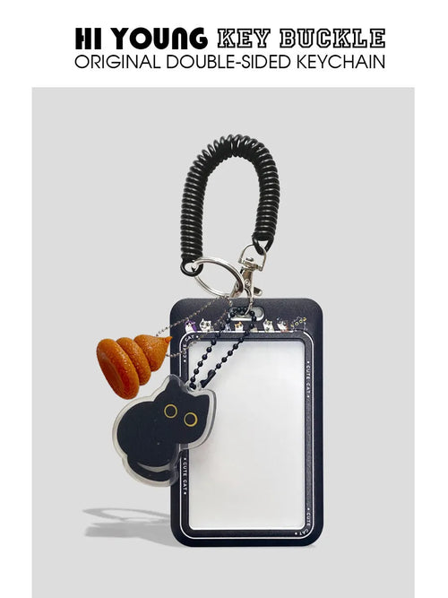 Cartoon black cat plastic card sleeve holder with a silver ferrule pendant attached.