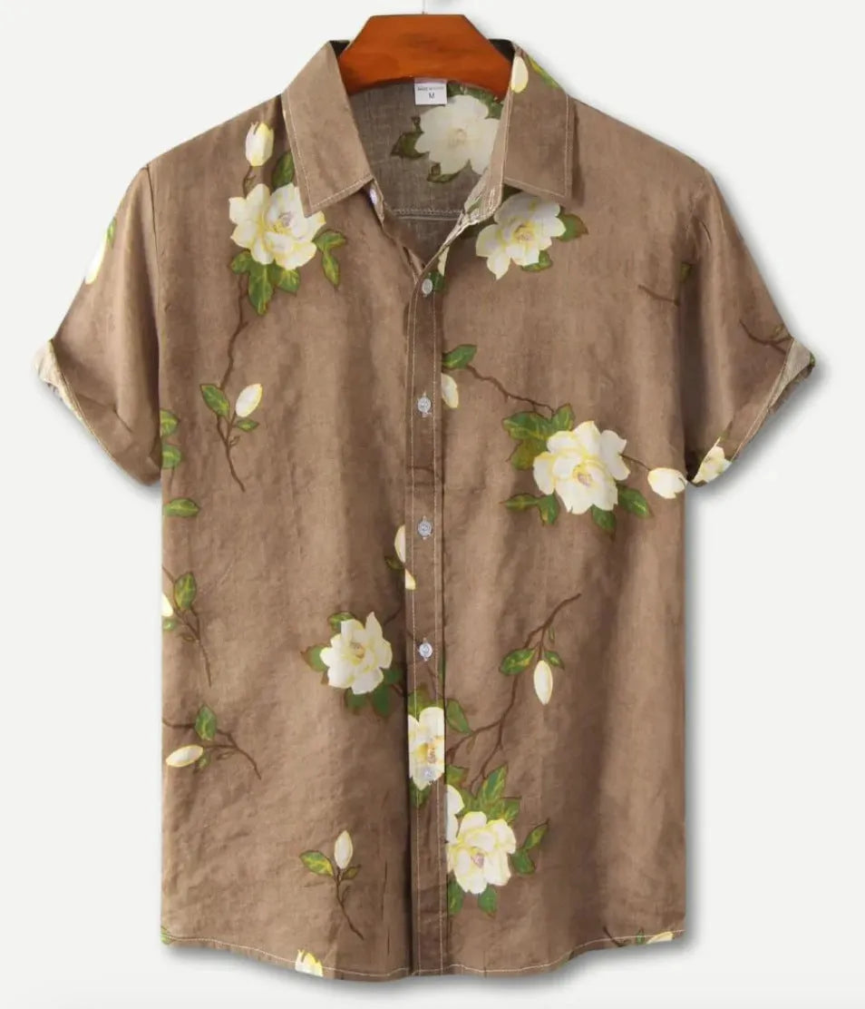 Man wearing a short sleeve Hawaiian print shirt with a floral lapel, made from elastic polyester fabric.