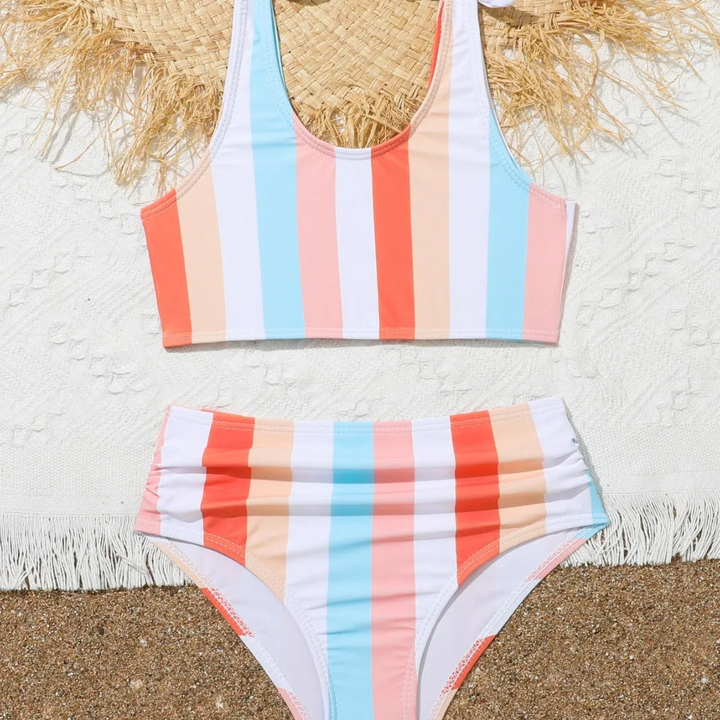 Girls printed plaid swimsuit set with briefs, polyester lining, sizes 2-3T to 11-12T, multiple colours