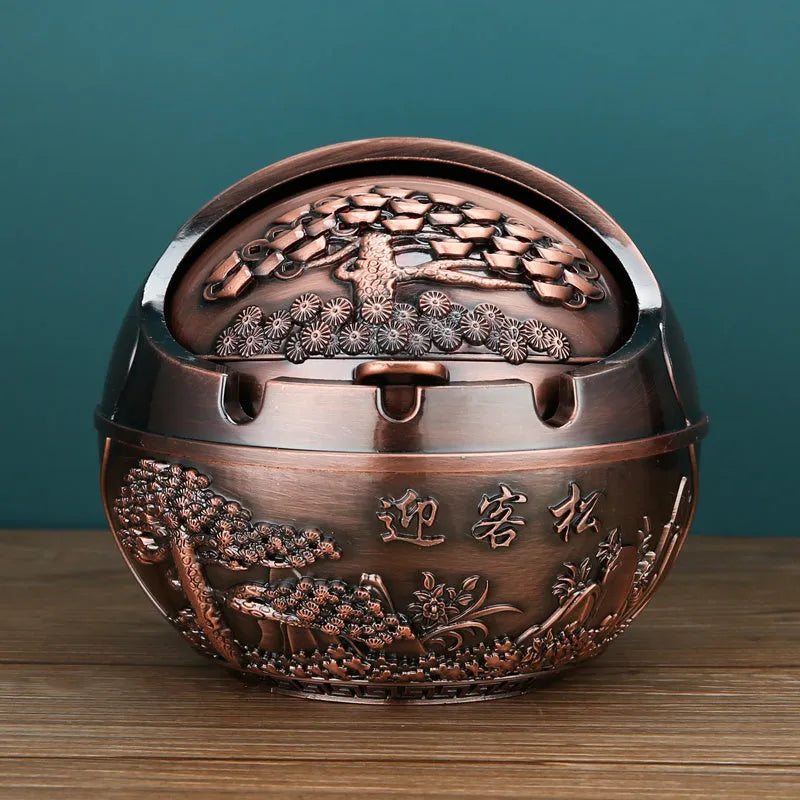 Alloy ashtray with smoke extinguishing slot in bronze finish featuring decorative dragon and phoenix design