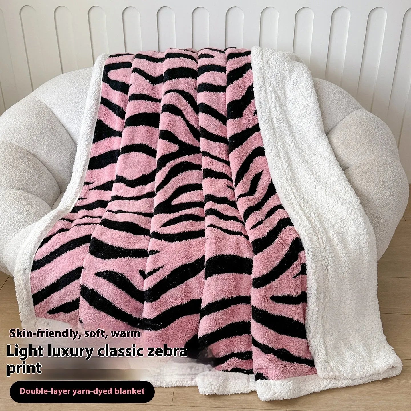 Double-layer leopard jacquard taffeta blanket in camel zebra pattern on a single bed.