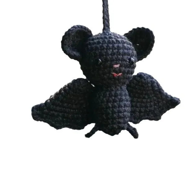 Plush hand-woven car hanging ornament in a cartoon design made from polyester
