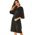Women's black A-line midi dress with elastic waist and long sleeves