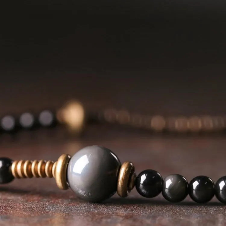 Black geometric stone bead bracelet with multi-layered design and colourful retro styling