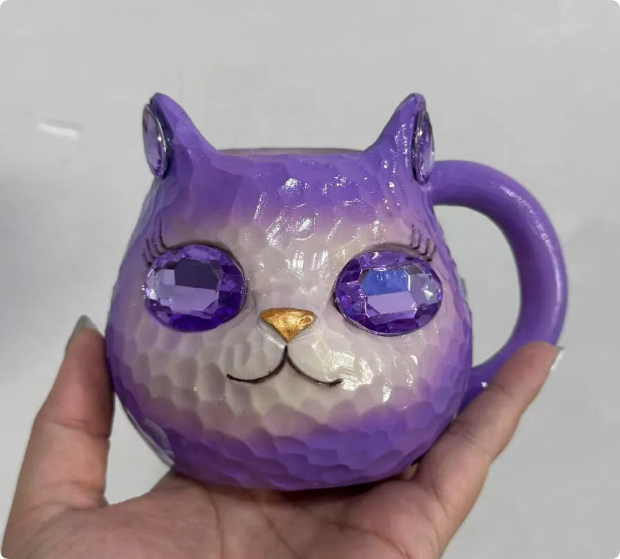 Crystal Earth Cat Cup resin craft decorative object in purple, green, blue, or pink colours.