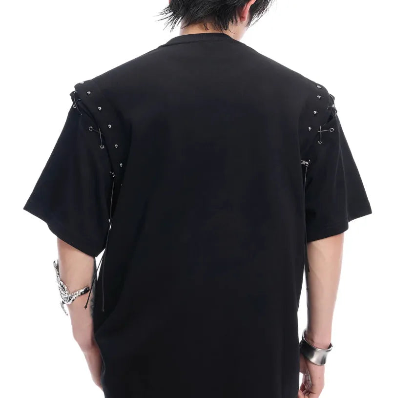Women's black deconstruction lace-up cutout short sleeve t-shirt on a hanger.