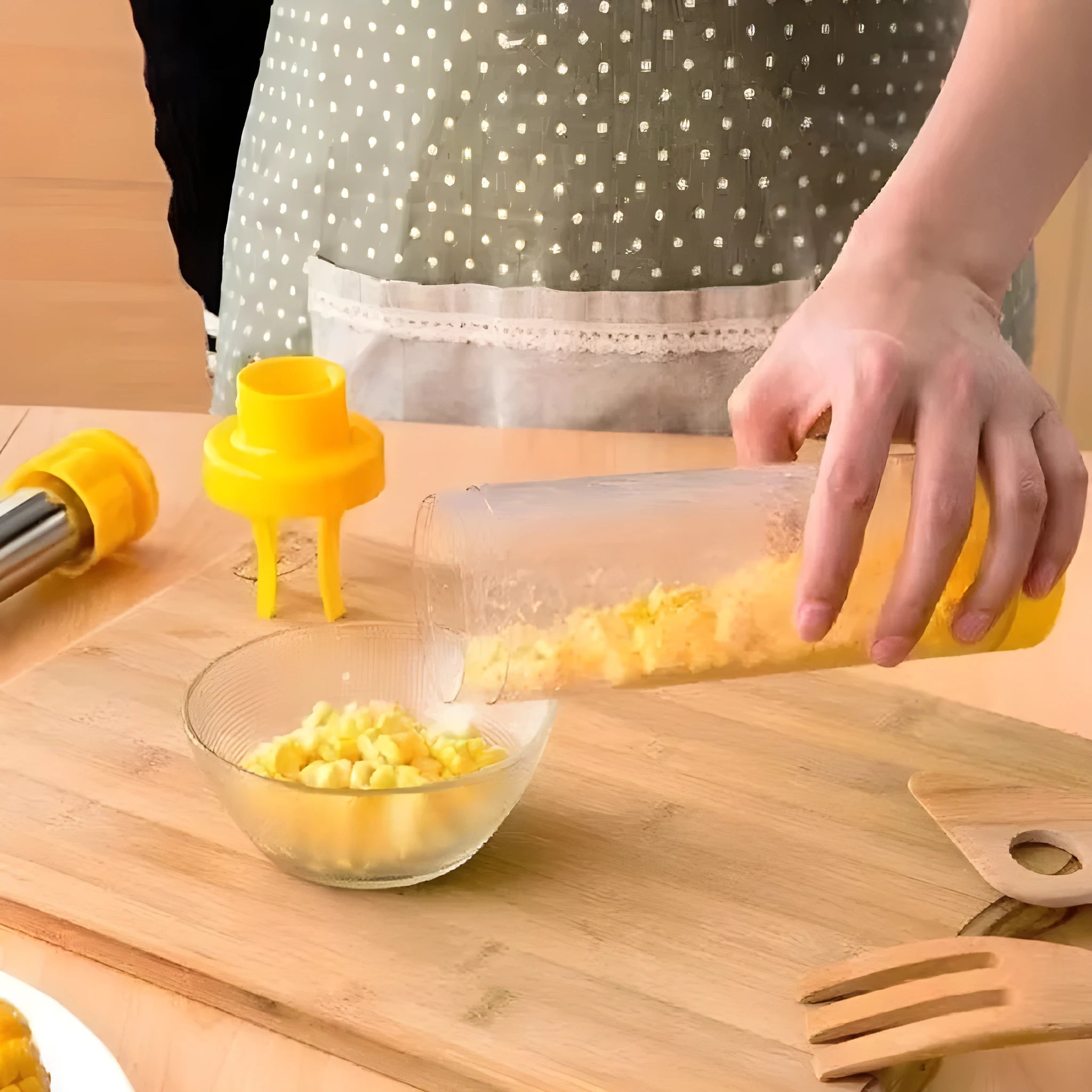 Yellow cylindrical corn stripper tool with ABS plastic and stainless steel construction for threshing corn kernels