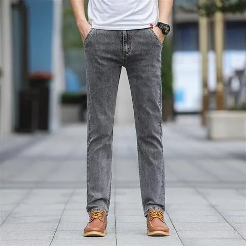 Men's straight leg jeans in smoky grey colour with a low waist and zipper fly