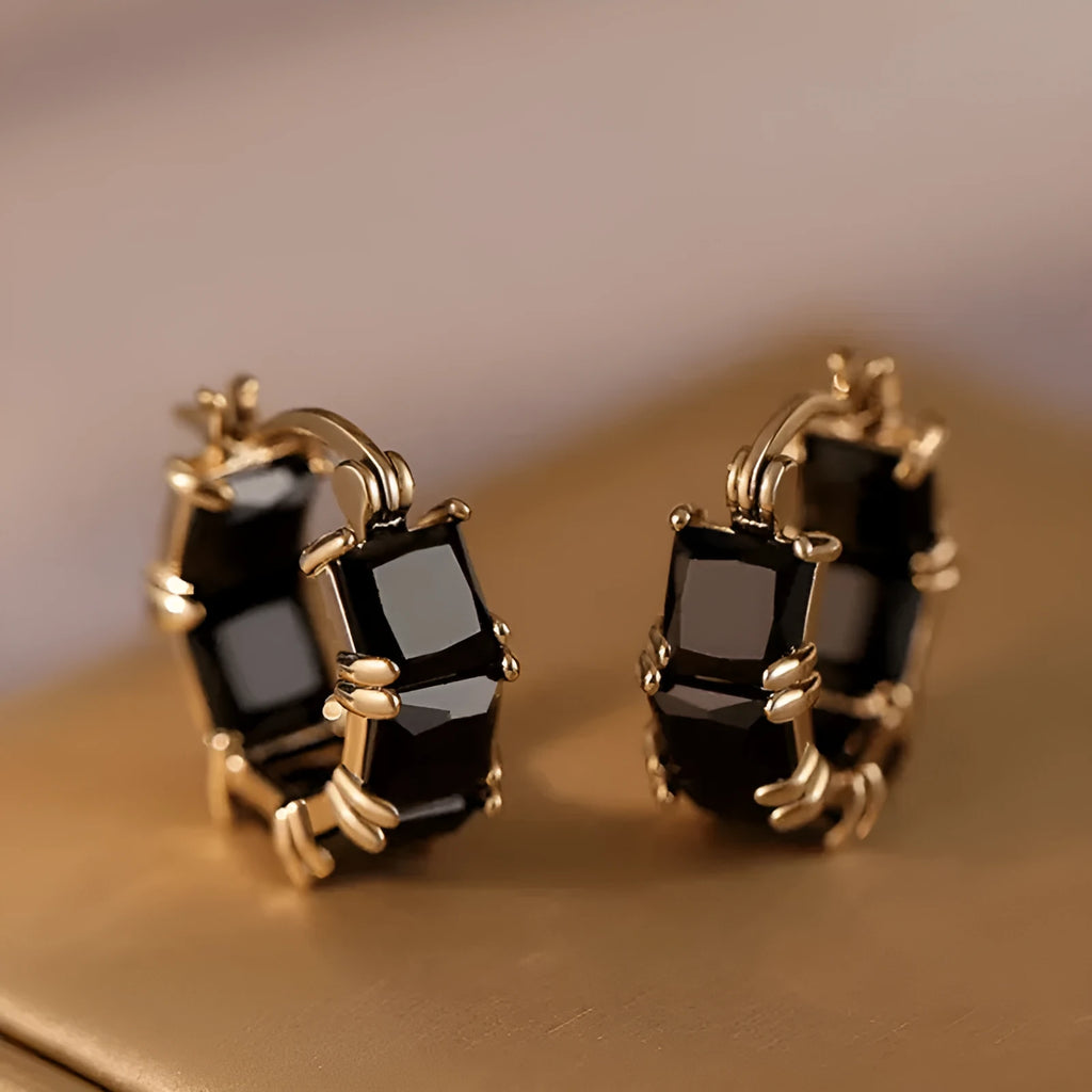 Geometric U-shaped gold electroplated copper ear rings with round black zircon settings