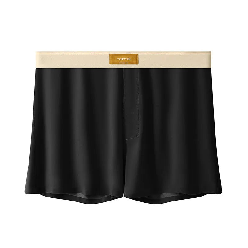 Pack of three pairs of men's solid colour ice silk underwear on a white background.