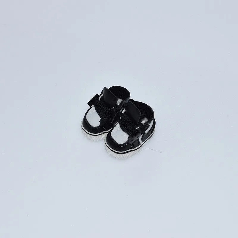 Set of miniature doll replacement shoes in various styles and colours for 17cm scale figures.