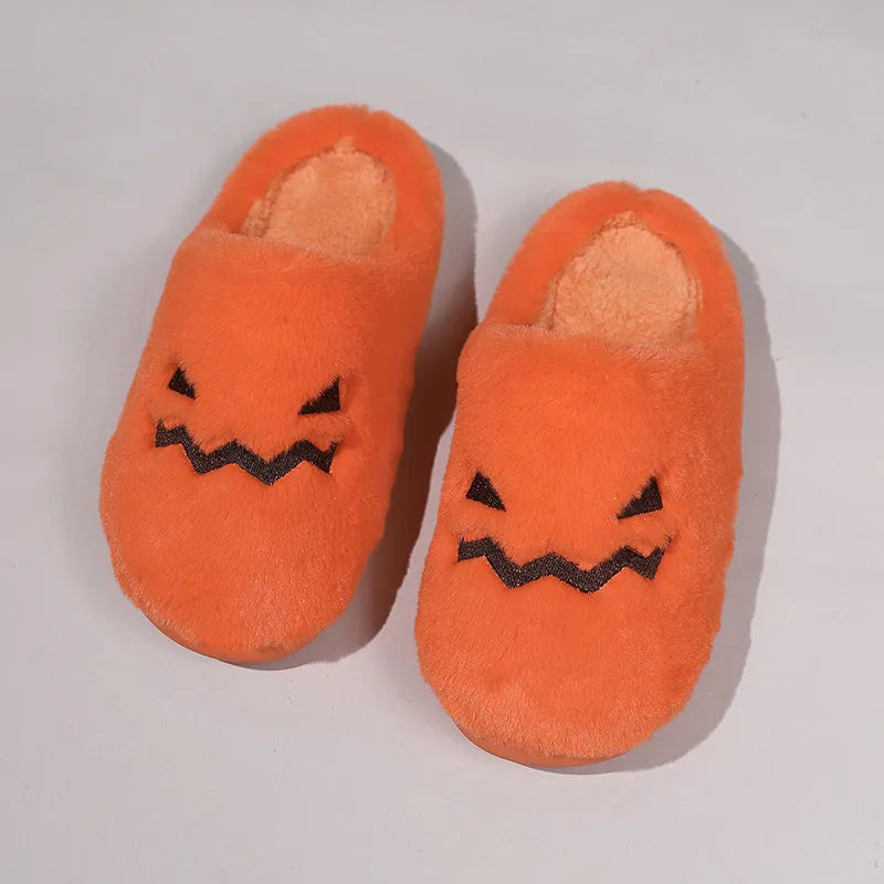 Orange pumpkin design Halloween slippers with plush lining and PVC sole for indoor home wear
