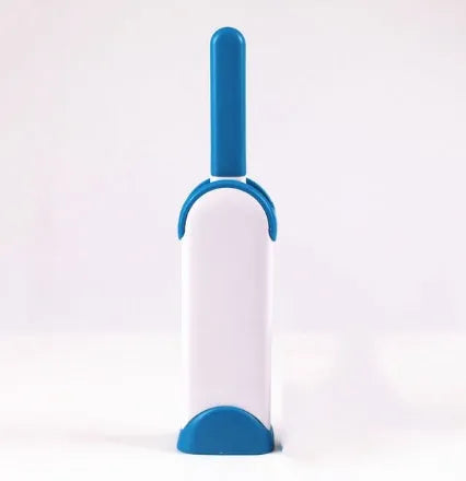 Reusable pet hair removal brush with double-sided roller and self-cleaning base