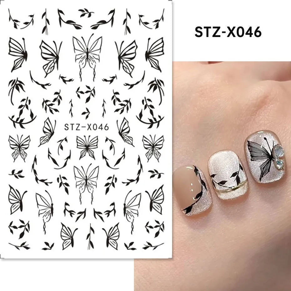Plastic sheet of black, silver, and cartoon design nail art stickers for DIY manicures.