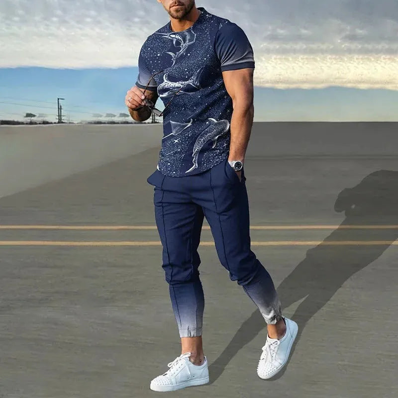 Man wearing a short-sleeved printed round neck pullover and matching trousers from a lightweight athletic suit set.