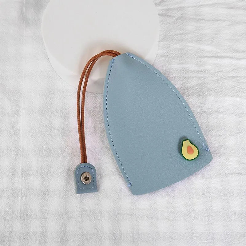 Cartoon pull-out key case in PU leather showing design options including resin fruit and big cartoon animal prints.