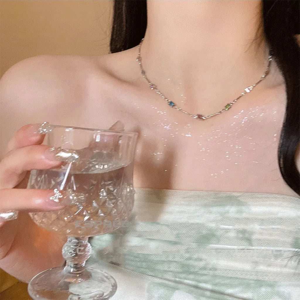 Square colour clavicle chain necklace with geometric quadrilateral crystal elements in gold and white K finishes