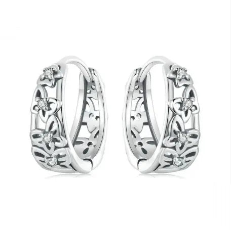 Sterling silver butterfly earrings with hollow design and zircon stone accents