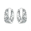 Sterling silver butterfly earrings with hollow design and zircon stone accents