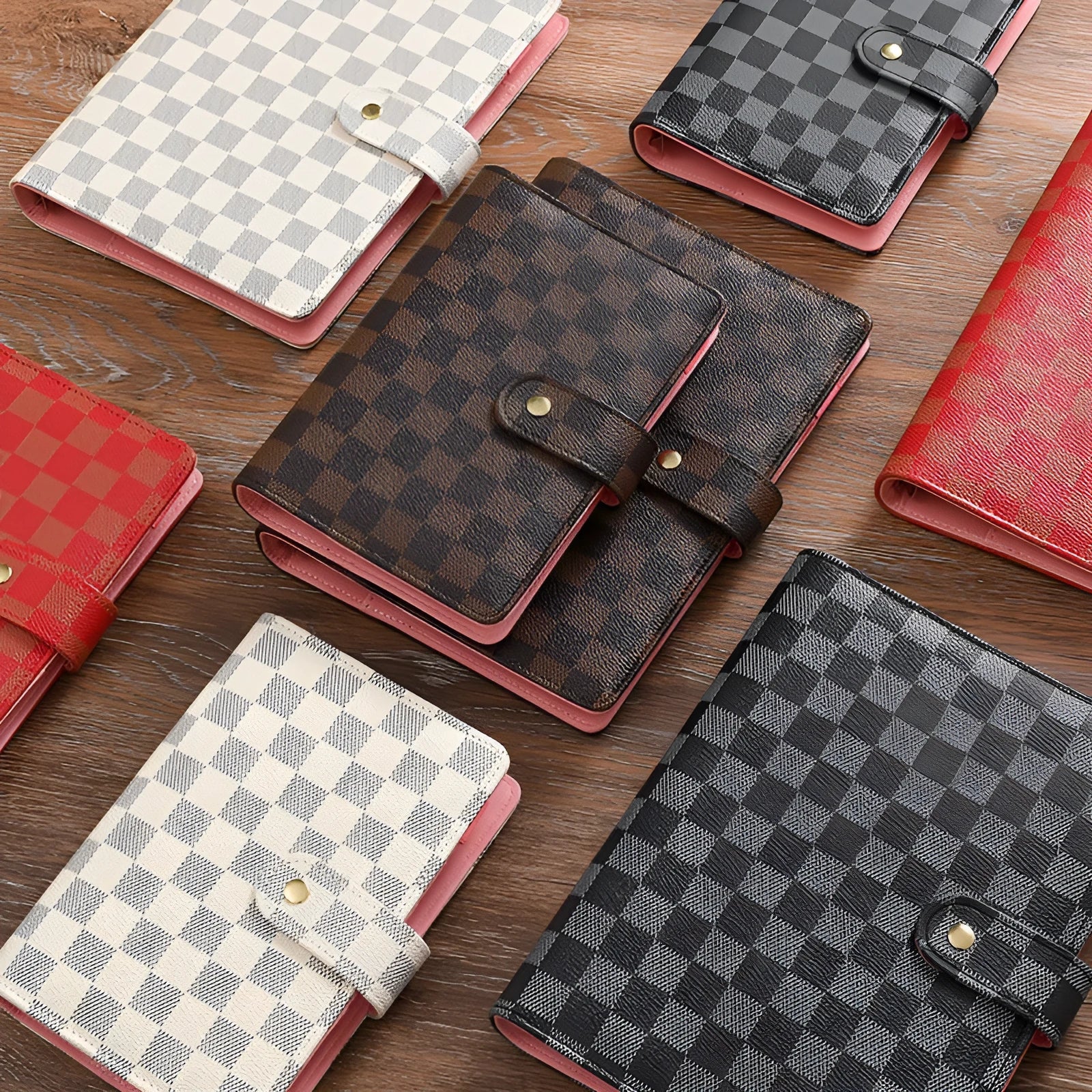 Loose-leaf notebook with red imitation leather cover, checkered pages, and ring binding in A5 size