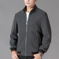 Men's grey sports-style fleece jacket with long sleeves and a stick pocket on the arm.