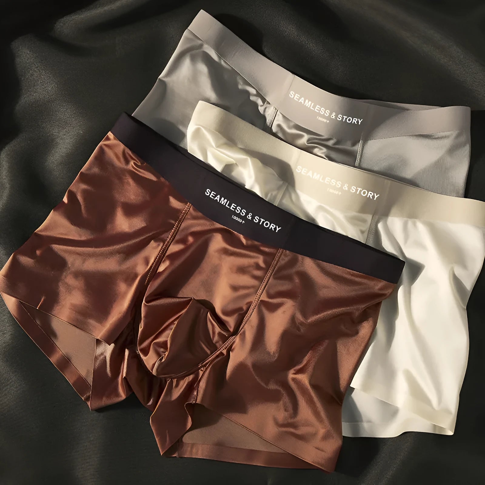 Men's light gray Ice Silk mid-waist underwear briefs laid flat.