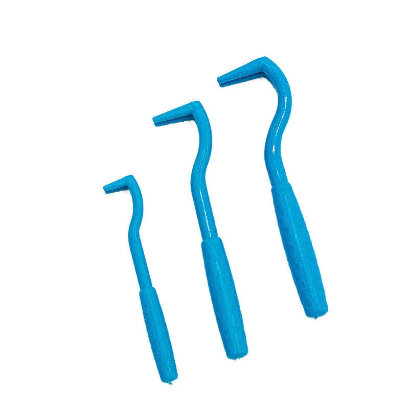 Three blue plastic pet tick removal clip tools with hook design for dogs and cats
