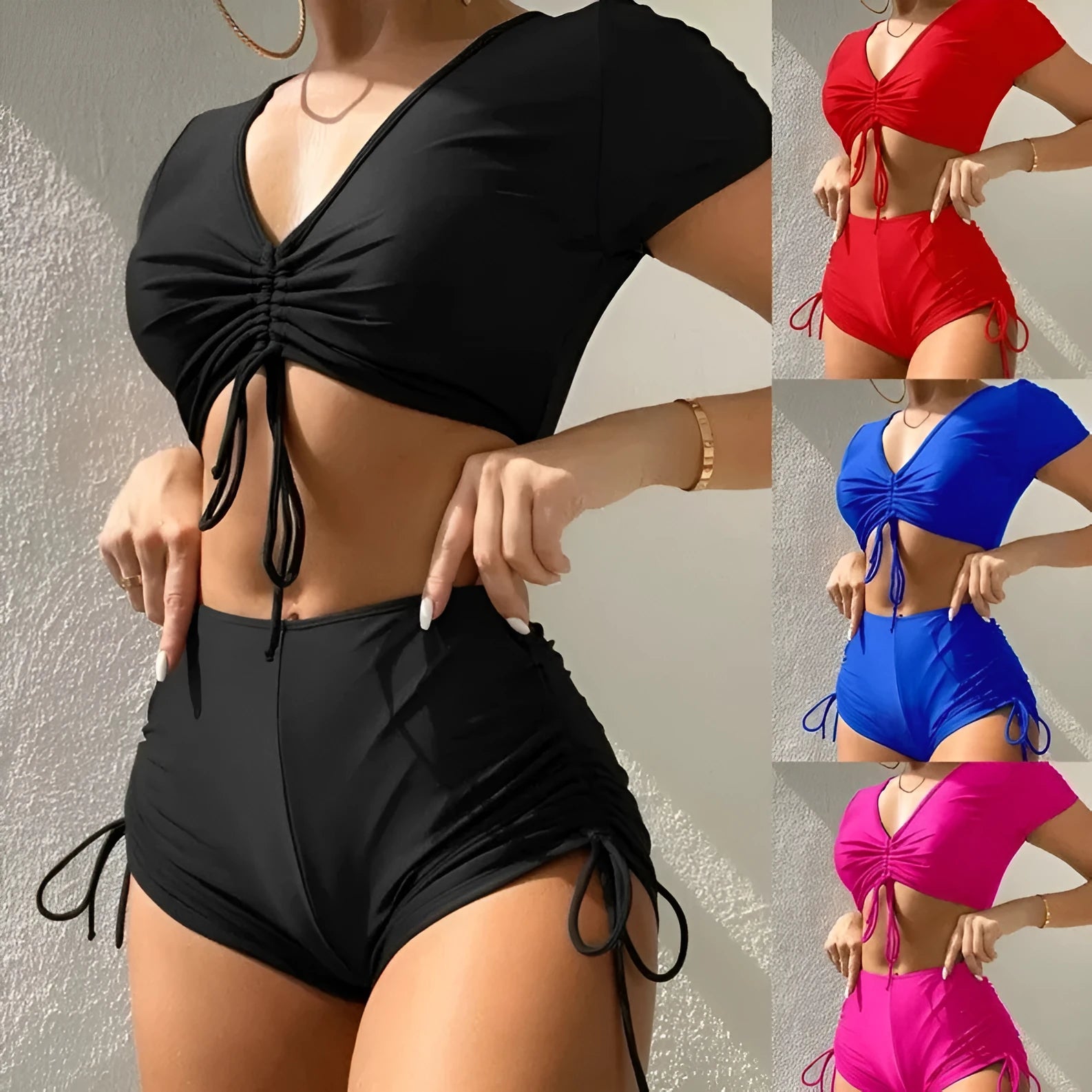Women's two-piece swimsuit with lace-up front and bow detail in dark green.