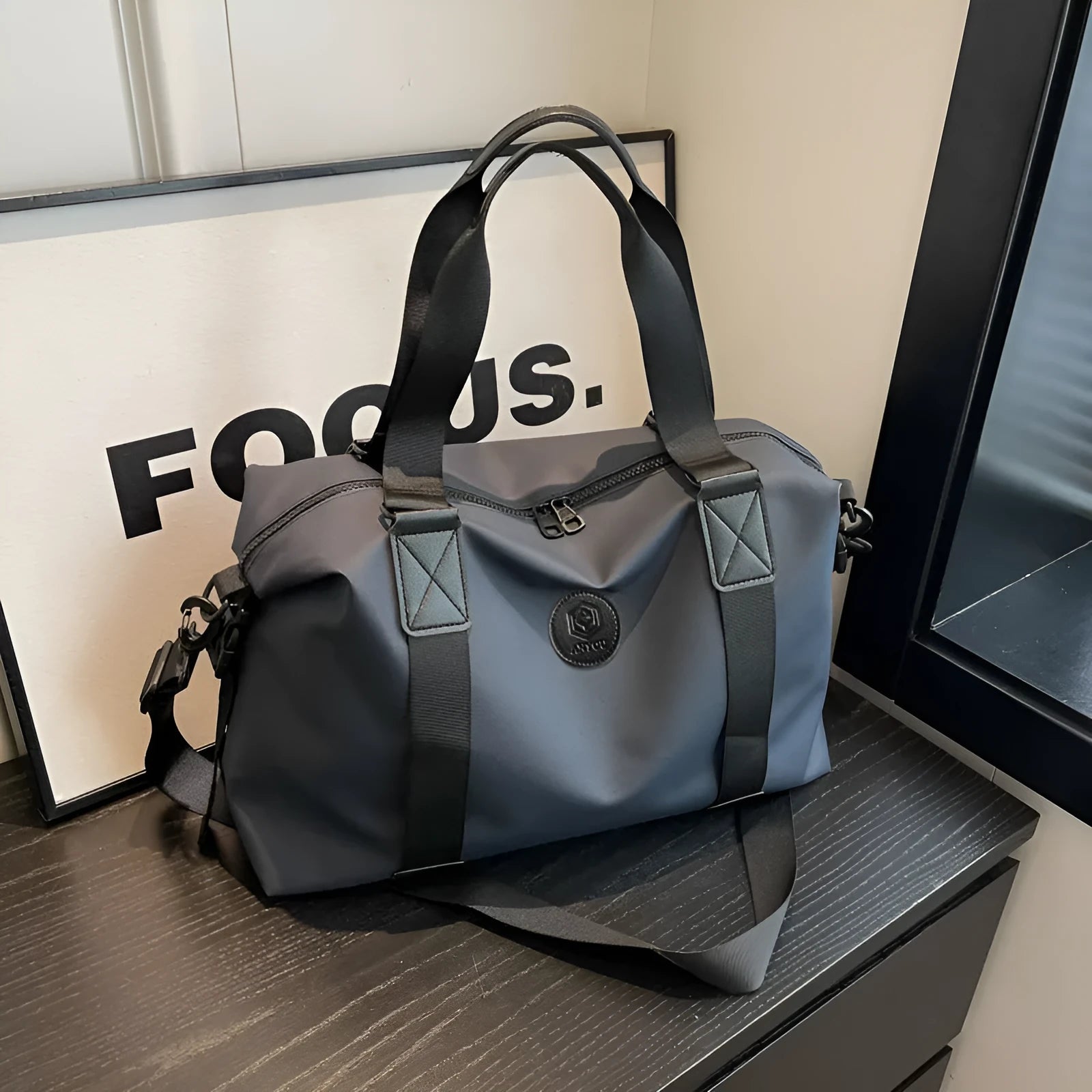 Waterproof Oxford cloth travel bag in solid colour with 36-55 litre capacity for short-distance trips